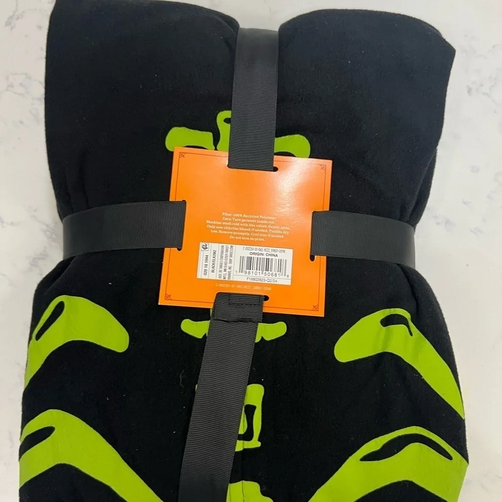 Hyde & Eek! Black Onesie with Neon Green Skeleton Design